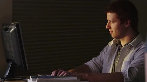 Portrait of businessman typing on computer Stock Footage 80260390