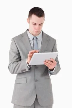 Portrait of a businessman using a tablet computer 스톡 사진
