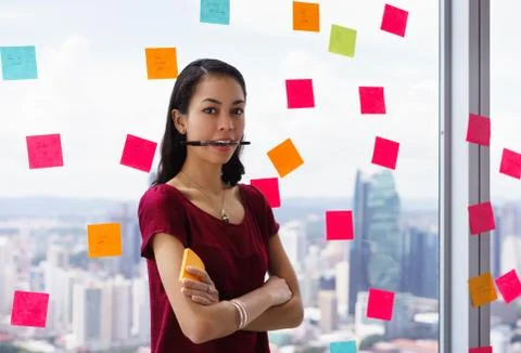 Portrait Busy Person With Many Sticky Notes On Office Window Stock Photos