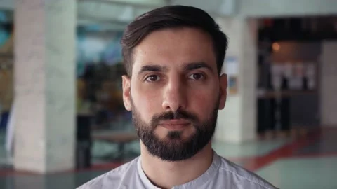 Portrait of a Caucasian man. Looking into the camera Stock Footage 170967397