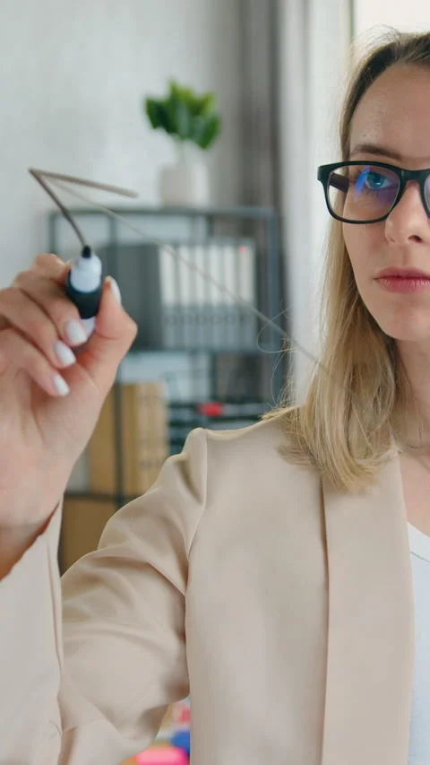 Portrait of charming smiling experienced creative female developer of design off Video stock 329187332