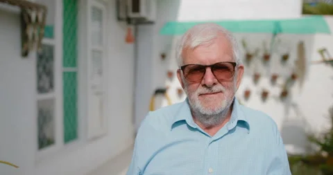 Portrait of a Cheerful Elderly Man Video stock 105166017