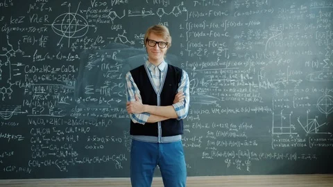 Portrait of cheerful guy standing in classroom smiling looking at camera with Stock Footage 124881847