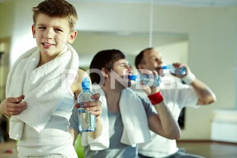 Portrait of cheerful little boy in gym at break Stock Photos
