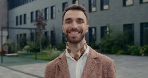 Portrait of cheerful man with beard looking and posing to camera. Crop view of Stock Footage 144723591