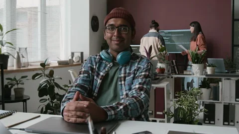 Portrait of Cheerful Nerdy Male Programmer with Headphones at Work Stock-Footage 285711073