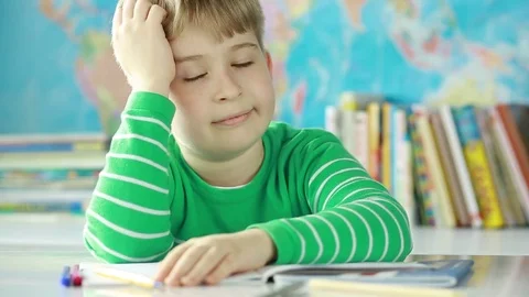 Portrait of a cheerful schoolboy. Elementary school student.  Stock Footage 74426393