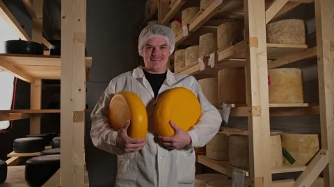 Portrait Of Cheesemaker In Cellar, Basement. Home Cheese Production, Business Vidéo 180015523