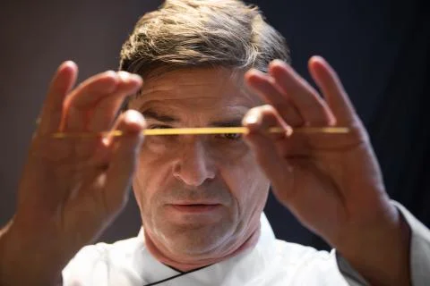 Portrait of a chef focusing on things Stock Photos