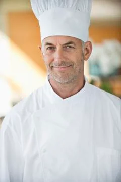 Portrait of a chef smiling Stock Photos