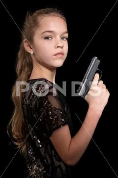 Portrait of child with a gun Stock Photos