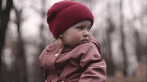Portrait of a child looking around Stock Footage 152302812