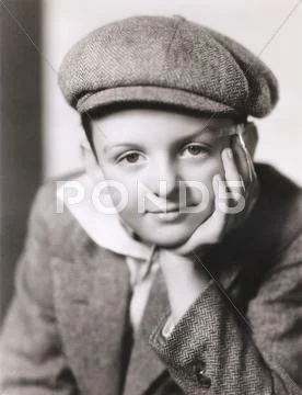 Portrait of child in newsboy cap Stock Photos