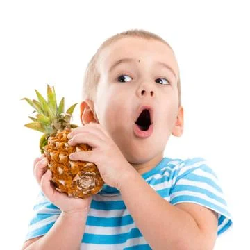Portrait of a child with pineapple Stock Photos