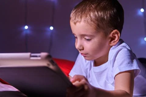 Portrait of a child with a tablet computer Stock Photos