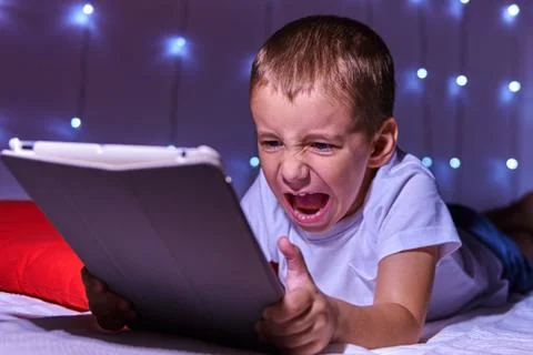 Portrait of a child with a tablet computer Stock Photos