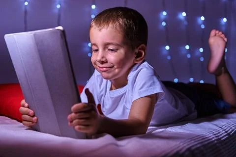 Portrait of a child with a tablet computer Stock Photos