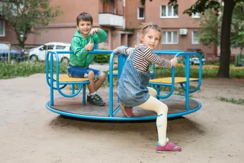 Portrait of children on the carousel Foto stock