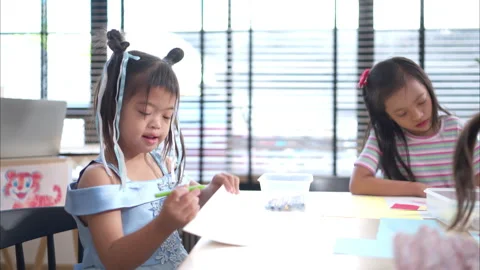 Portrait of children doing learning activities in the classroom Stock Footage 308053728