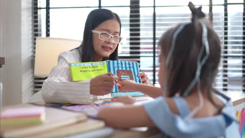 Portrait of children doing learning activities in the classroom Stock Footage 308064848
