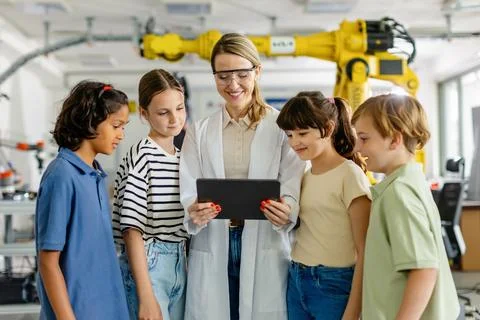 Portrait of children learning robotics in Elementary school, standing with 写真素材