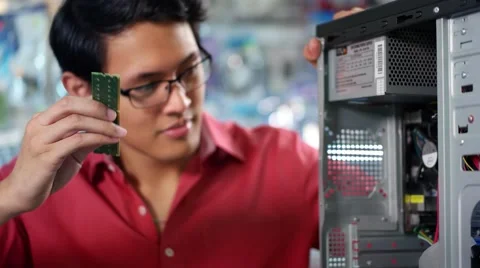 Portrait Of Chinese Man Reparing PC In Computer Shop Stock Footage 48783089