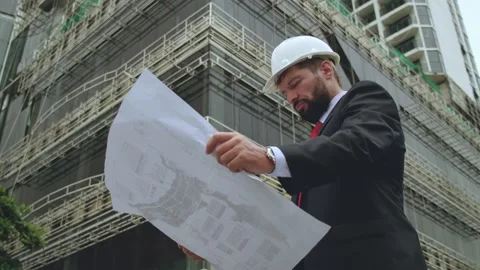 Portrait of a civil engineer, controller, designer, developer is at a Stock Footage 162332932