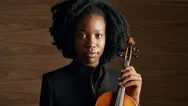 Portrait Of Classical Musician Holding Violin African American Woman Stock Footage