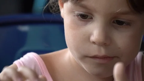 Portrait close-up face of a child 5-6 years. A Russian blonde girl with ponyt Stock Footage 105352543