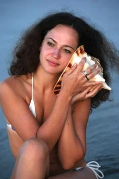 Portrait with a cockleshell Stock Photos