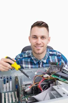 Portrait of computer engineer repairing cpu Foto stock