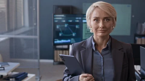 Portrait of Confident Female Network Engineer Holding Tablet in Office 動画素材 334931672