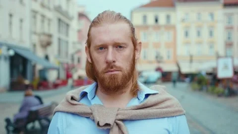 Portrait of confident ginger hipster bearded man in shirt standing on beautiful Stock Footage 139095004