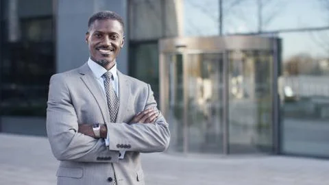 Portrait of confident male business man smiling to camera, with space for text Stock Photos