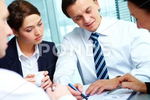 Portrait of confident professionals planning work Stock Photos