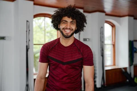 Portrait of confident young middle eastern man looking at camera at the gym Stock Photos
