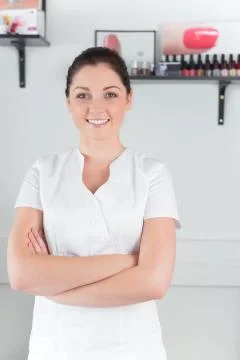 Portrait of confident young woman at nail salon Stock Photos