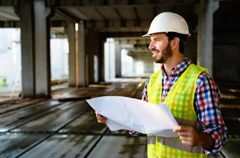 Portrait of construction architect, engineer working on building site Fotos de archivo