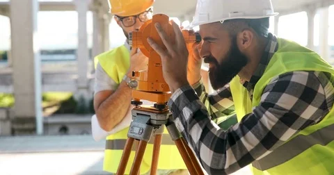 Portrait of construction engineers working on building site Stock Footage
