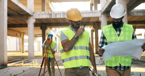 Portrait of construction engineers working on building site Stock Footage 80254033