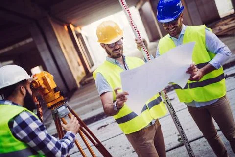 Portrait of construction engineers working on building site Fotos de archivo