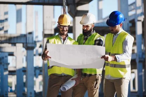 Portrait of construction engineers working on building site Foto stock