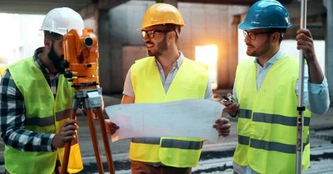 Portrait of construction engineers working on building site Fotos de archivo
