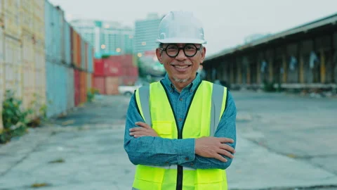 Portrait of Construction Supervisor Stands Confidently at a Cargo Yard During Stock-Footage 306185869