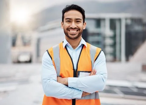 Portrait, construction worker and man smile with arms crossed with solar panel Stock Photos