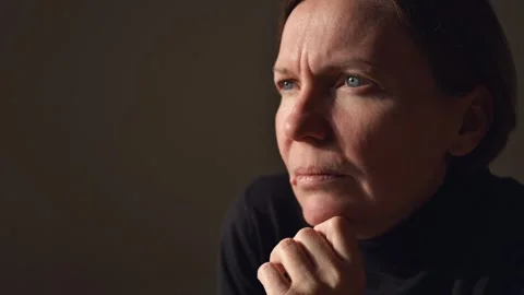 Portrait of contemplative female philosopher, thinking and planning, 4K Stock Footage 295452542