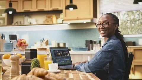 Portrait of content creator editing with color grading for video montage Stock Photos