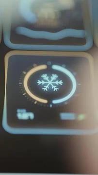 Portrait control tile features a large snowflake dial for adjusting cooling Stock Photos