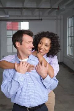 Portrait of Couple in Empty Loft Apartment Stock Photos