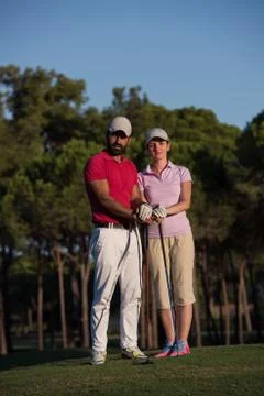 Portrait of couple on golf course Fotos Stock